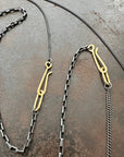 18k gold and oxidized silver chain