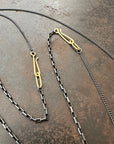 18k gold and oxidized silver chain