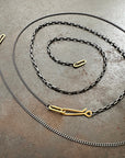 18k gold and oxidized silver chain