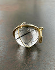 black tourmaline in quartz orb set in 18k gold pendant