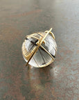 black tourmaline in quartz orb set in 18k gold pendant