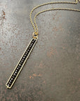 Black Diamond Beaded Stick Pendant