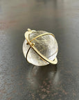 rutilated quartz orb pendant in 18k gold setting