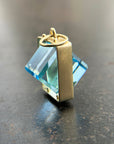 blue topaz cube pendant in 18k gold