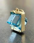 blue topaz cube pendant in 18k gold