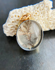 dendritic quartz pendant in gold setting