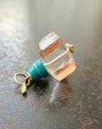 iron quartz geometric bead with turquoise bead pendant in 18k gold