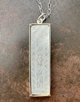 mother of pearl carved pendant with silver 3 way paperclip chain