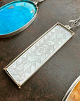 mother of pearl carved pendant with silver 3 way paperclip chain