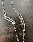 mother of pearl carved pendant with silver 3 way paperclip chain