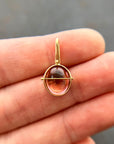 pink tourmaline oval pendant in 18k gold