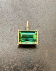 green radiant cut tourmaline pendant in 18k gold