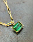 green radiant cut tourmaline pendant in 18k gold