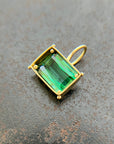 green radiant cut tourmaline pendant in 18k gold