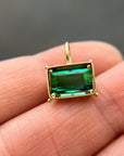 green radiant cut tourmaline pendant in 18k gold