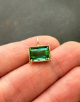 green radiant cut tourmaline pendant in 18k gold