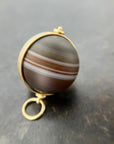 banded saturn agate pendant in 18k gold