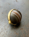 banded saturn agate pendant in 18k gold