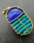 scarab shaped pendants of 18k gold, lapis, and turquoise beads