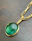 teal green tourmaline oval pendant in 18k gold