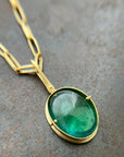 teal green tourmaline oval pendant in 18k gold