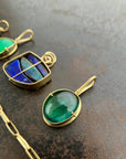 teal green tourmaline oval pendant in 18k gold