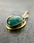teal green tourmaline oval pendant in 18k gold