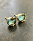 blue topaz stud earrings in 18k gold setting