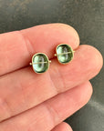 blue topaz stud earrings in 18k gold setting