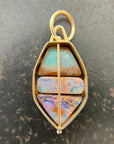 three wood opal pendnt in 18k gold