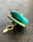 chinese hand carved turquoise beads with an 18k gold bale.