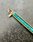 persian turquoise beads strung in a 14k gold frame, turquoise pendant, gold pendant