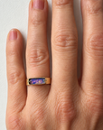 purple wood opal set in an 8k gold ring