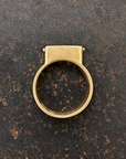 purple wood opal set in an 8k gold ring