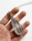 Captured Black Tourmaline in Quartz Teardrop Pendant on Long Chain