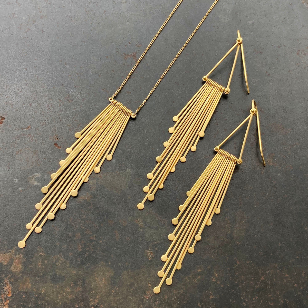 18k gold fringe earrings and necklace