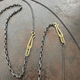 18k gold and oxidized silver chain