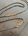 18k gold and oxidized silver chain