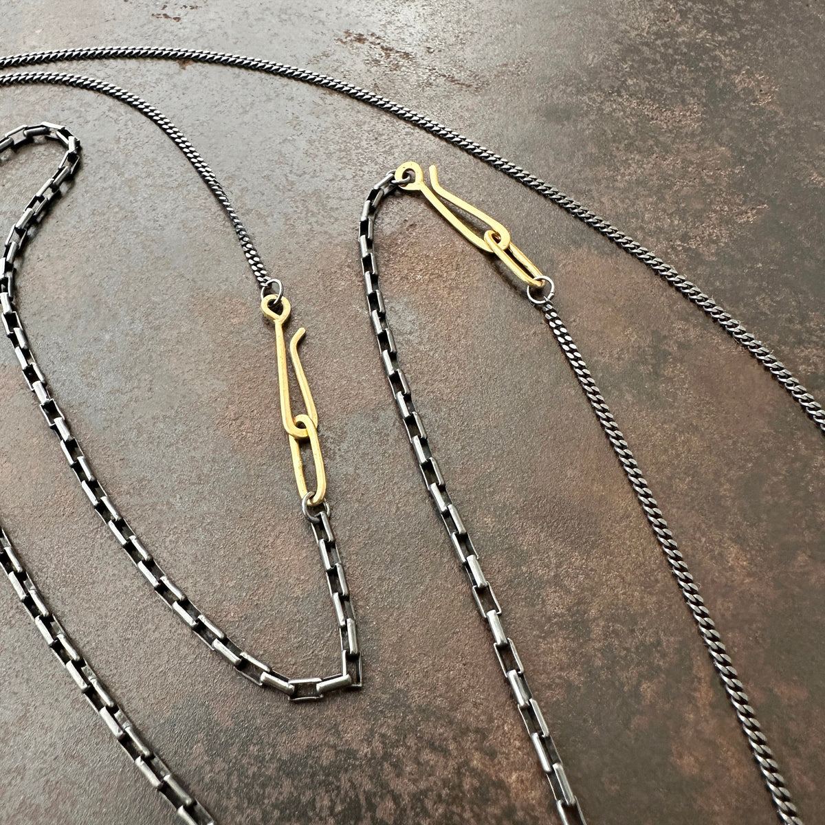 18k gold and oxidized silver chain