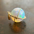 Ethiopian opal orb pendant set in 18k gold  