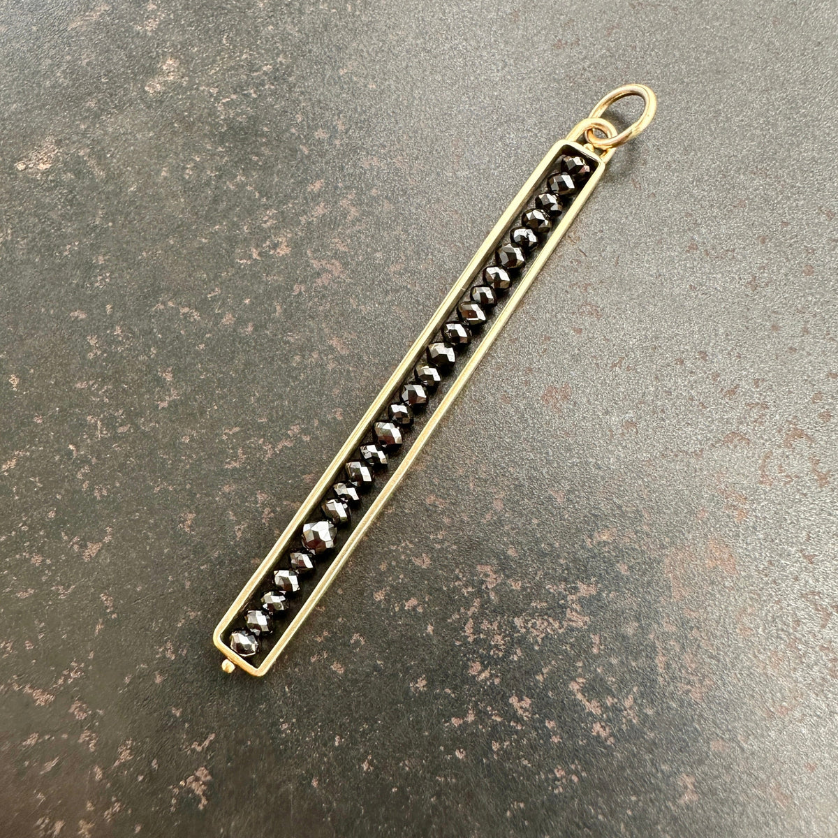 Black Diamond Beaded Stick Pendant