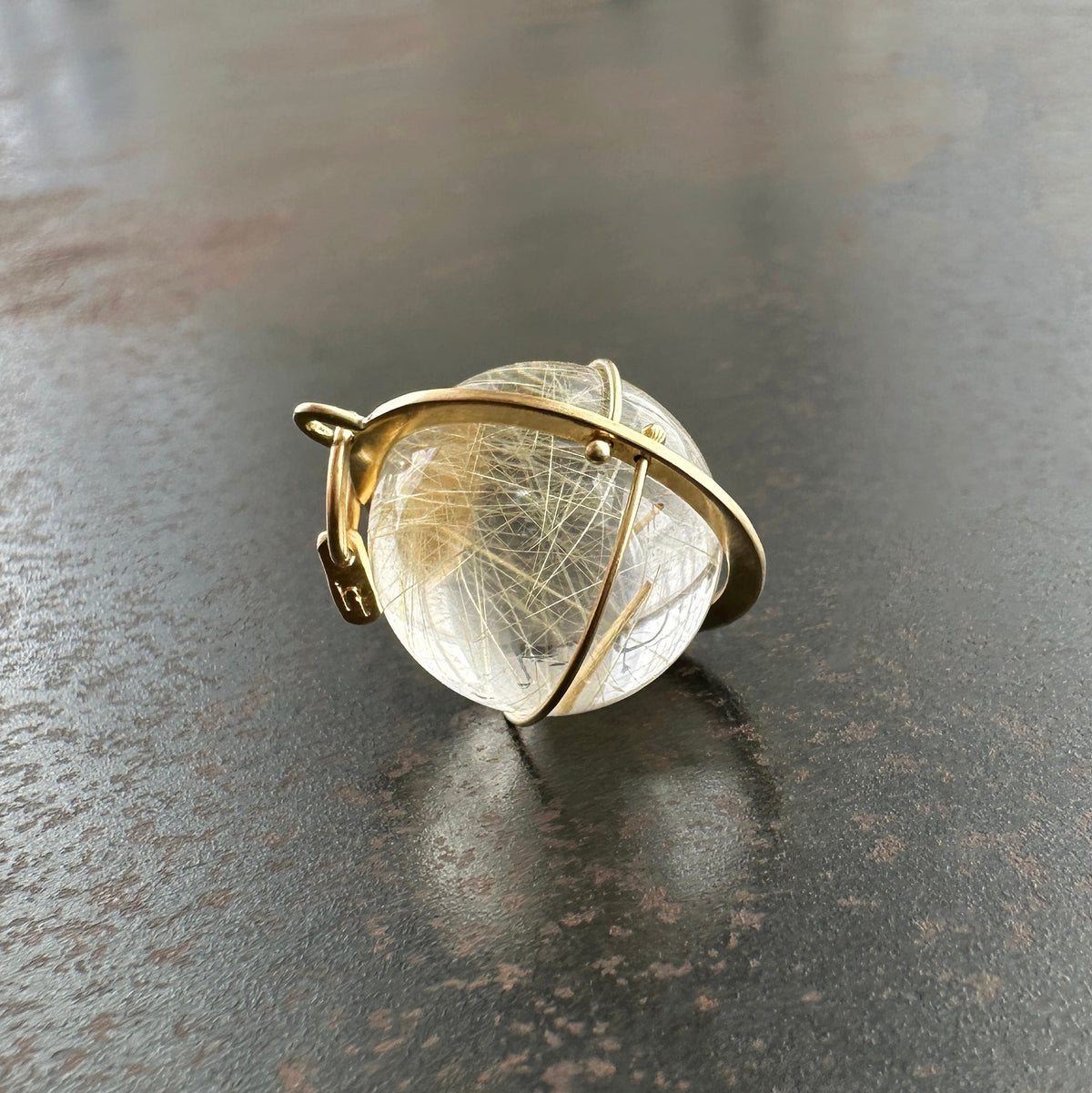 rutilated quartz orb pendant in 18k gold setting