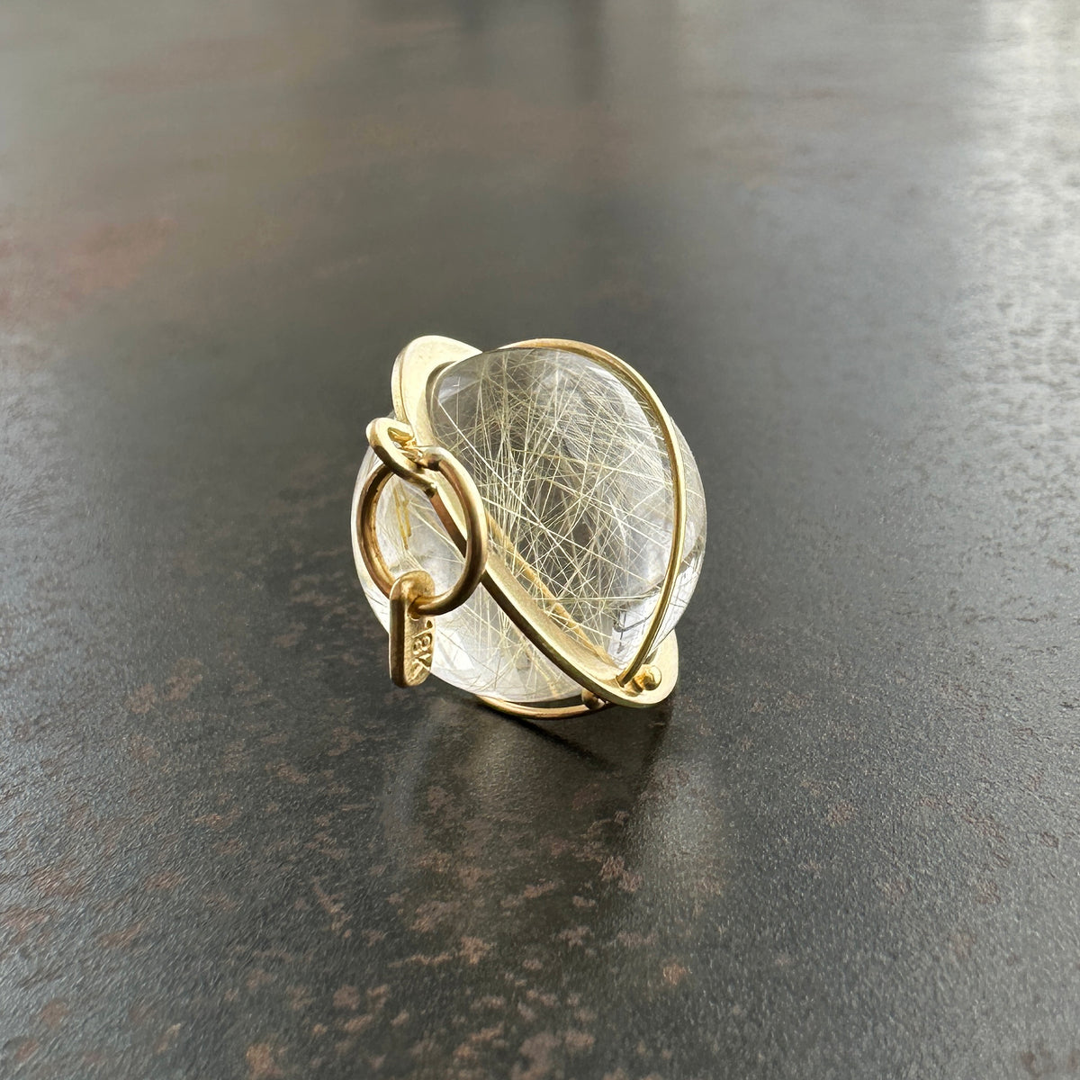 rutilated quartz orb pendant in 18k gold setting