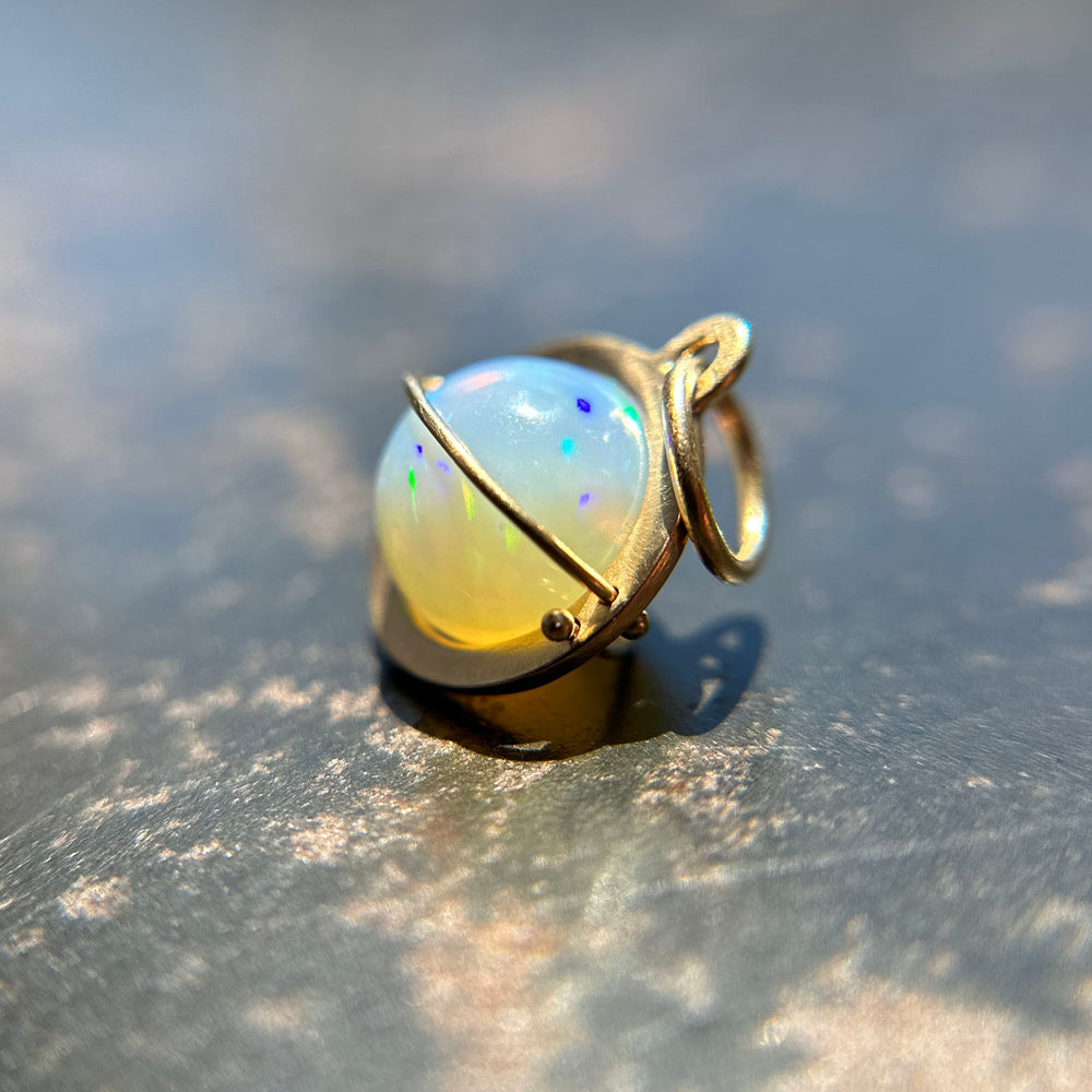 
                
                    Load image into Gallery viewer, Captured Blue Moon Opal Orb Charm
                
            