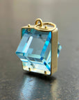 blue topaz cube pendant in 18k gold