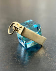 blue topaz cube pendant in 18k gold