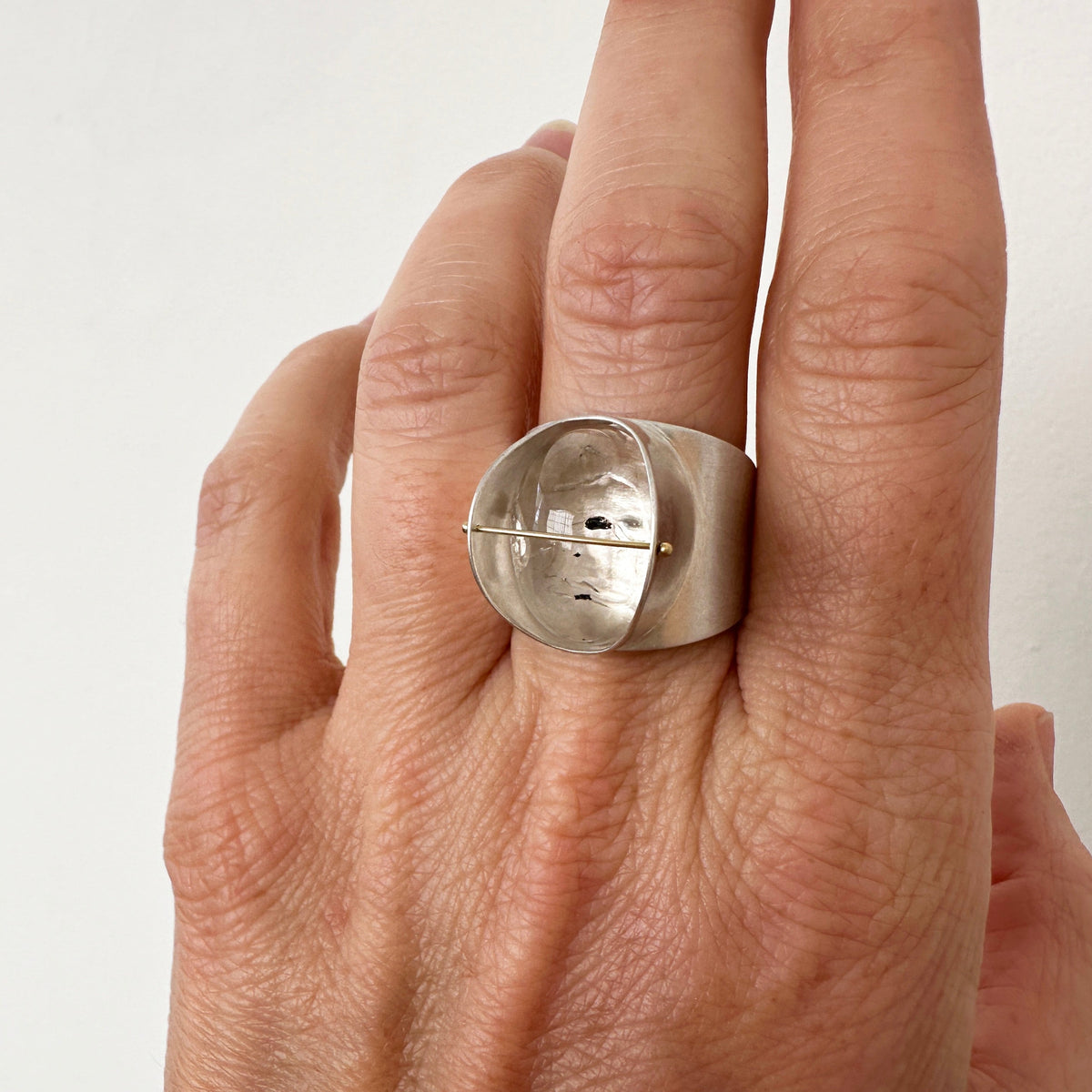 Captured Carbon Enhydro Parabola Ring