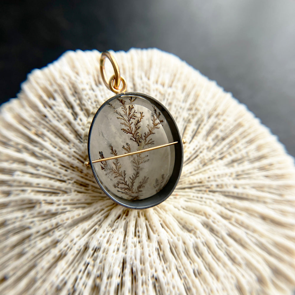 dendritic quartz pendant in gold setting
