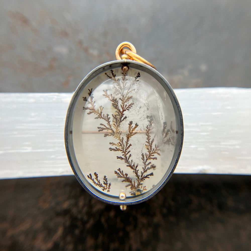 dendritic quartz pendant in gold setting