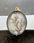 dendritic quartz pendant in gold setting